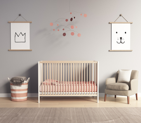 Modern nursery room with salmon red and greyaccents