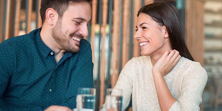 Romantic loving couple having date in a cafe