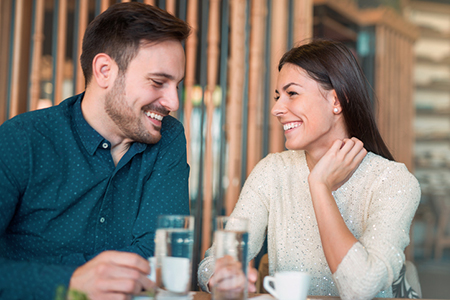 Romantic loving couple having date in a cafe